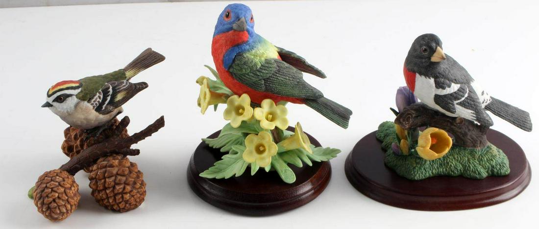 LENOX PORCELAIN PAINTED BUNTING & BIRD FIGURINES: Lot of 3 all marked Lenox fine porcelain. First is the 1997 Painted Bunting, 5x5 inches. Second is the 1991 Rose-breasted Grosbeak, 4x4 inches. Last is the 1991 Golden Crowned Kinglet, 5 x 3 1/2 inche