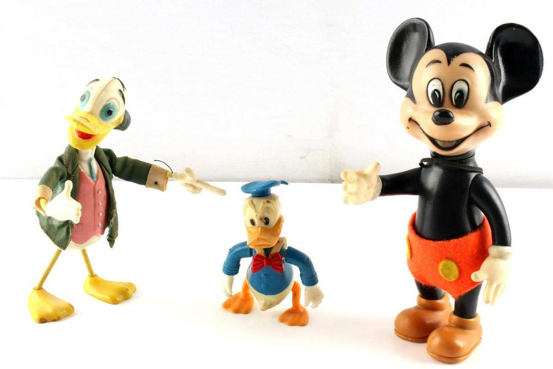 LOT OF 3 VINTAGE DISNEY TOYS MICKEY MOUSE ETC: Lot of 3 vintage 1960's Disney toys. Includes Mickey Mouse, Donald Duck, and Ludwig von Drake. Toys are in varying condition with some repairs being made to the Donald Duck and Ludwig von Drake toys. 