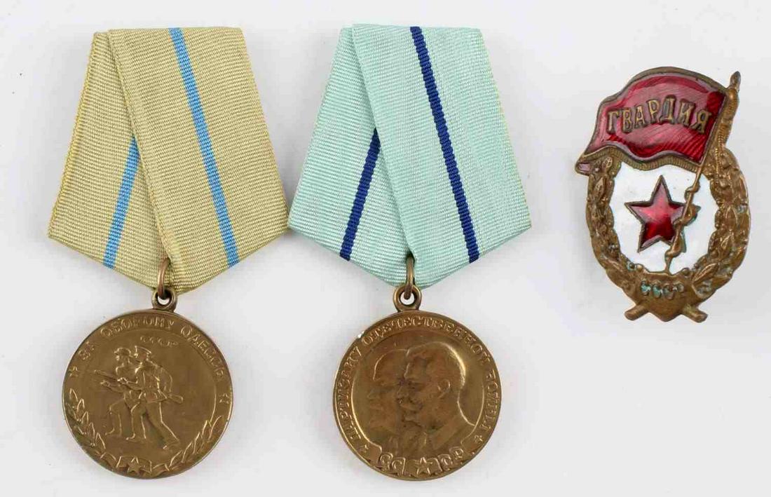 WWII SOVIET RUSSIAN USSR ARMY MEDALS BADGES LOT: One (1) 2nd Class Partisan of the Patriotic War medal. Features Stalin and Lenin to obverse with a teal with blue stripe ribbon. 3 1/2 X 2 inches. One (1) WWII Defense of Odessa medal. Features two so