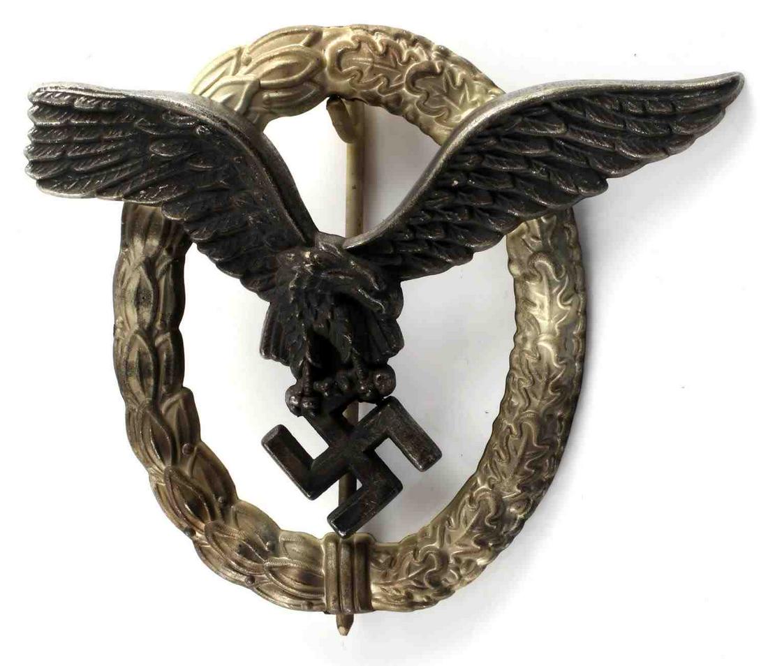 WWII GERMAN THIRD REICH LUFTWAFFE PILOT BADGE: Third Reich Luftwaffe pilot/observer badge. Features oak leaves surrounding eagle. Assman maker on reverse. Pin lays 180 degrees. Unauthenticated, sold as is.