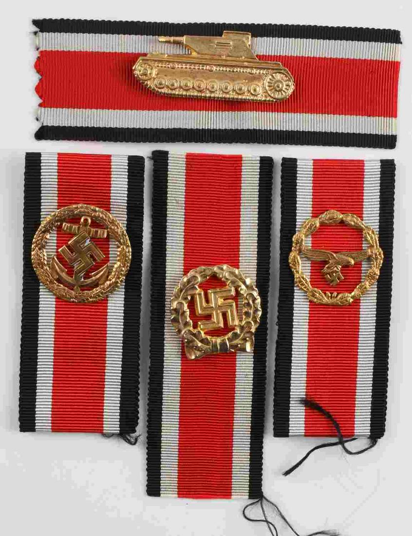 WWII GERMAN REICH ARMY KRIEG MEDALS ON RIBBON: WWII German Reich 4 medals including a Panzer III medal, a Kreigsmarine medal, a Luftwaffe medal, and a political medal. All in good condition, with two prongs each, by which they are pinned onto ribb