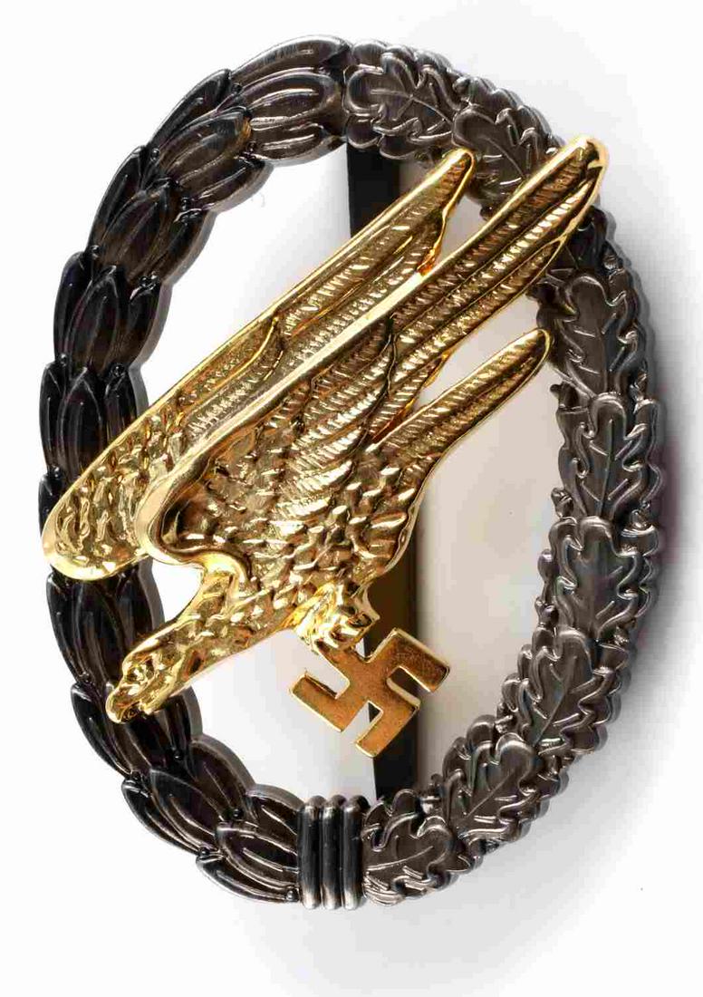 REENACTOR WWII GERMAN THIRD REICH LUFTWAFFE BADGE: Reenactor Third Reich WWII German Third Reich Luftwaffe paratrooper badge. C.E. Junker Berlin on reverse. Measures 2 1/4 inches.