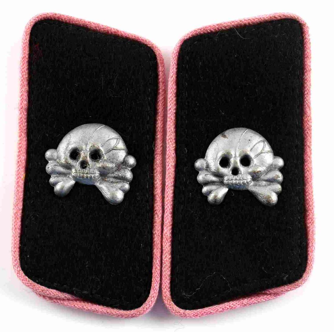 WWII GERMAN THIRD REICH SS PANZER COLLAR TAB PAIR: A pair of WWII German Third Reich SS Totenkopf Panzer collar tabs. Measure 3 x 1 1/2 inches. Unauthenticated, sold as is.