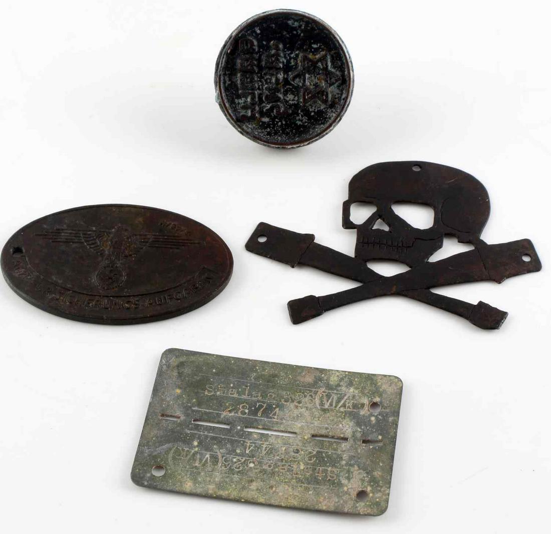 WWII THIRD REICH GERMAN LOT OF 4 TRENCH ART ID TAG: Includes: POW ID tag, German Kripo state warrant disk, trench art metal skull and crossed grenades, and Jewish ink stamp with Star of David. Oxidation evident, good condition.