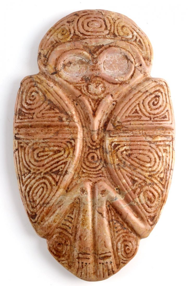 NATIVE AMERICAN TAINO HUMAN BIRD TRANSITIONAL AXE: Taino. Extremely large human to bird transitional ax. Fully engraved front with complex system of integrate bird head symbols. Since dirts were shaman and shaman/priest allies, representing metaphysic