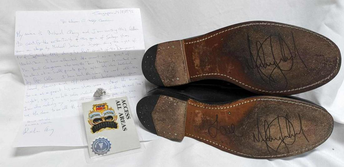 1993 MICHAEL JACKSON TWICE SIGNED SEBAGO SHOES: Lot includes a pair of Sebago shoes each signed by the legendary "King of Pop" himself, Michael Jackson, worn during the final performance of his "1993 Dangerous World Tour". Also includes a handwritt