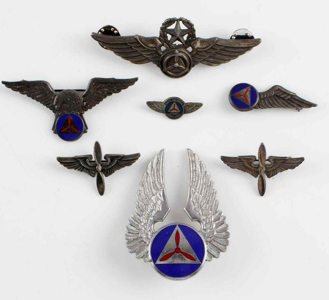WWII VIETNAM CIVIL AIR PATROL STERLING INSIGNIA: Includes sterling Robbins pilot wings, air crew wings 2 1/2 and 1 1/2 inches, 2 sterling AAC collar insignia, sterling lapel pin, and non silver Meyer cap badge, and silver filled 3 inch senior pilot 