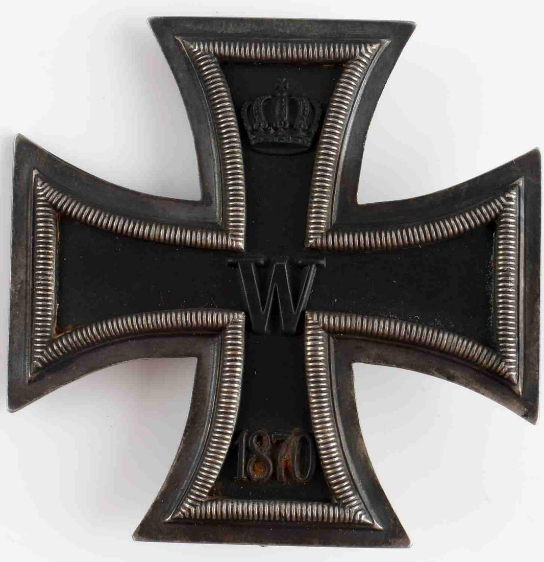 WWII GERMAN THIRD REICH 1870 IRON CROSS 1ST CLASS: 1870's Iron Cross 1st class. Early wide rim type. Tests for silver. Named to L. Wagner & S. 14 Loth. Measures 1 3/4 inches. Good condition. This lot has a reserve.