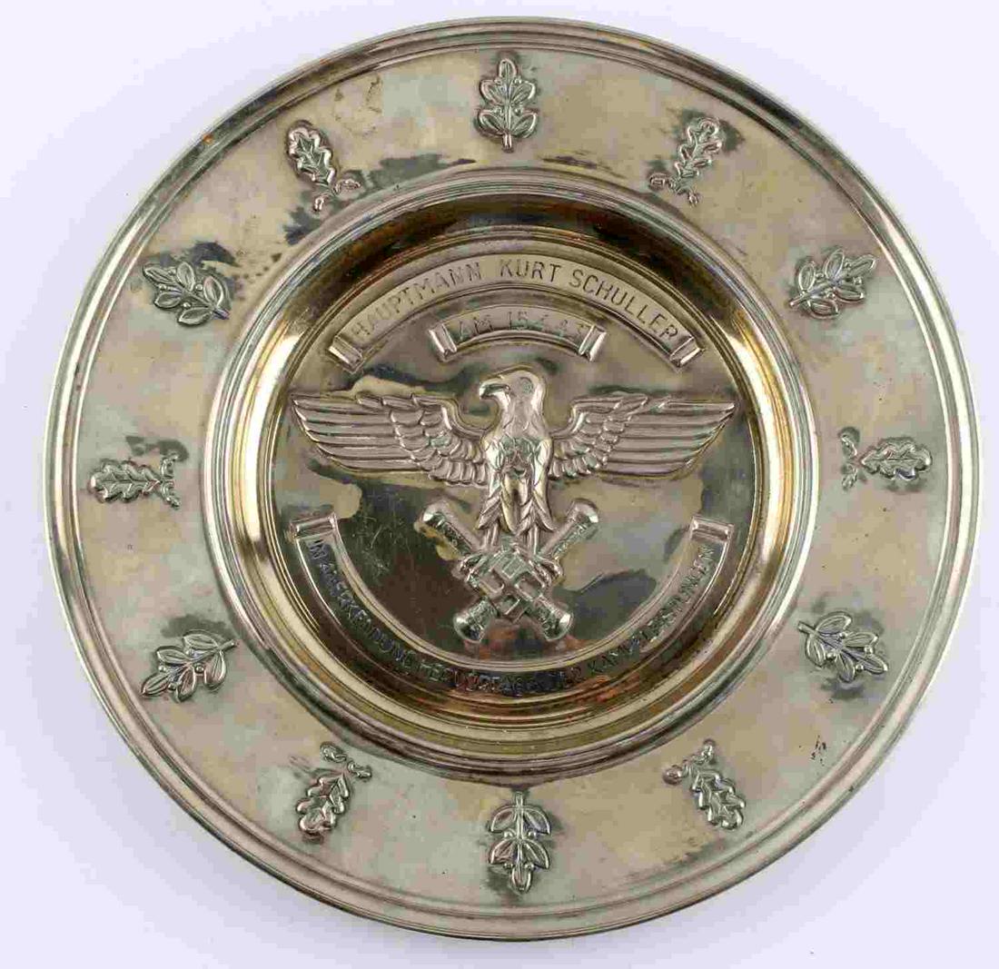 WWII GERMAN REICH LUFTWAFFE SILVER PLATE OF HONOR: WWII Third Reich Luftwaffe Salver of Honor. Features a silver toned plate with a Reichsadler clutching batons and a swastika. Awarded to Hauptmann Kurt Schuller on 15/4/43. Reverse marked Feinsilber A