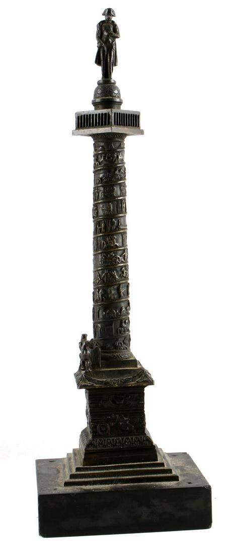 20TH CENTURY FRENCH OBELISK WITH NAPOLEON: 20th century French obelisk measuring 10 3/4 inches tall on a base which measures 3 9/16 inches wide by 3 9/16 inches deep. Features Napoleon Bonaparte atop. Is missing two of the eagles supposed to b