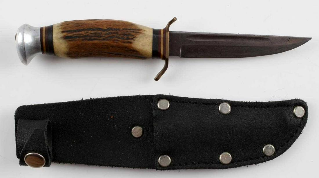 VINTAGE SOLINGEN GERMANY STAG FIXED BLADE KNIFE: Vintage Solingen Germany stag handle fixed blade knife. "Solingen Germany" marked onto the base of the blade. Measures approximately 7 inches long. Comes with a sheath. Very good condition overall.