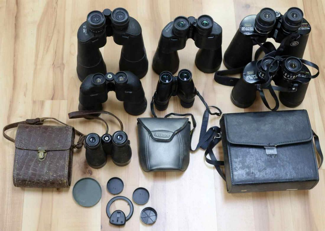 7 PAIR OF BINOCULARS ORION TASCO SIMMONS NIKON: Mixed lot used they seem to have clear optics, 7 in all, sold as is.