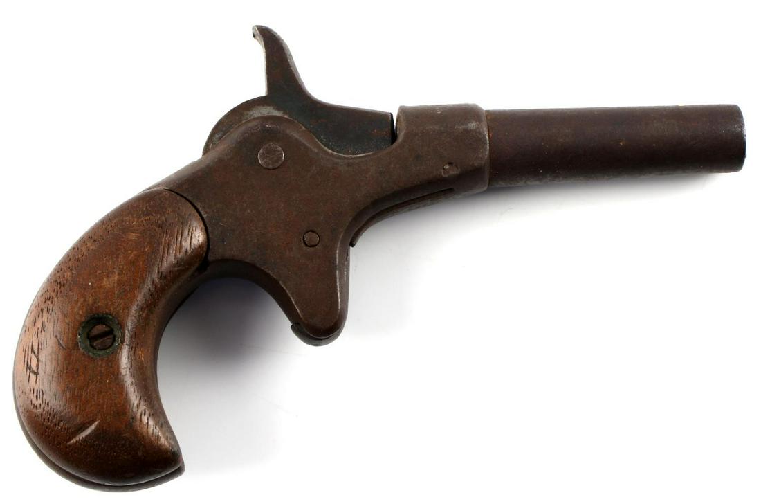 ANTIQUE VEST POCKET DERRINGER .22 CAL FOR PARTS: Unknown maker. 2.25 inch barrel with dusty bore, wood grips, brown patina, hammer does not engage, not working. Cannot ship internationally. Caliber: .22 Serial #: nsn