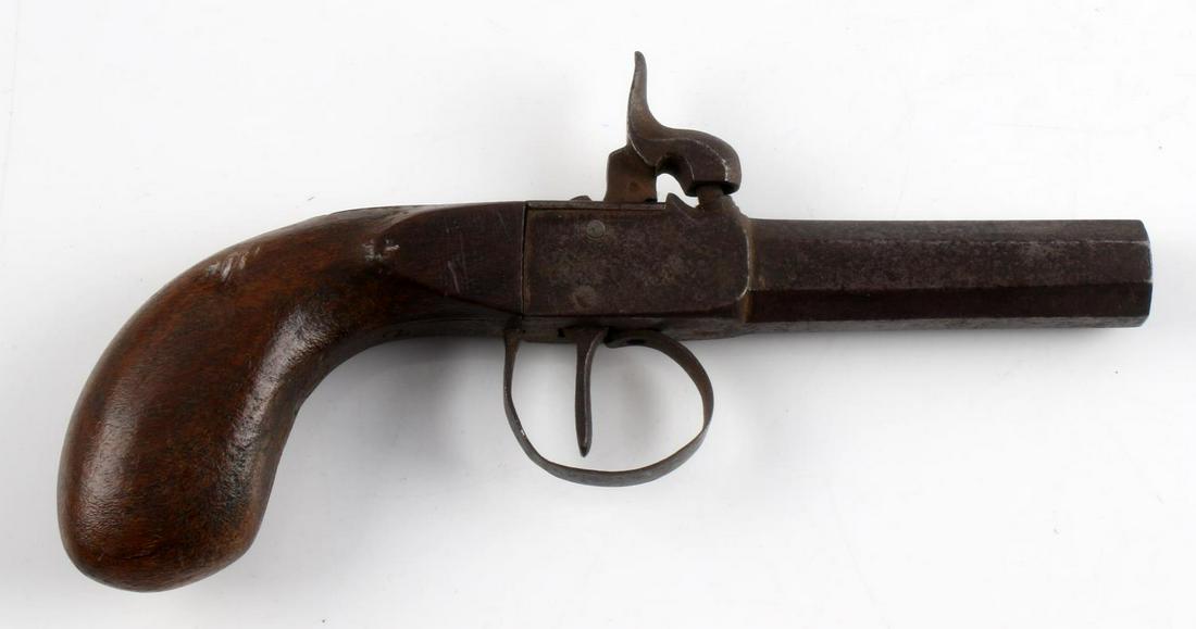 ANTIQUE PERCUSSION .41 CAL BOOT PISTOL OCTAGON: 1800's boot pistol with a 2.75 inch octagonal barrel with oxidized but clear bore, LI mark in circle to left side barrel flat, crest at top of barrel, maybe British, wood grip, mechanically functional