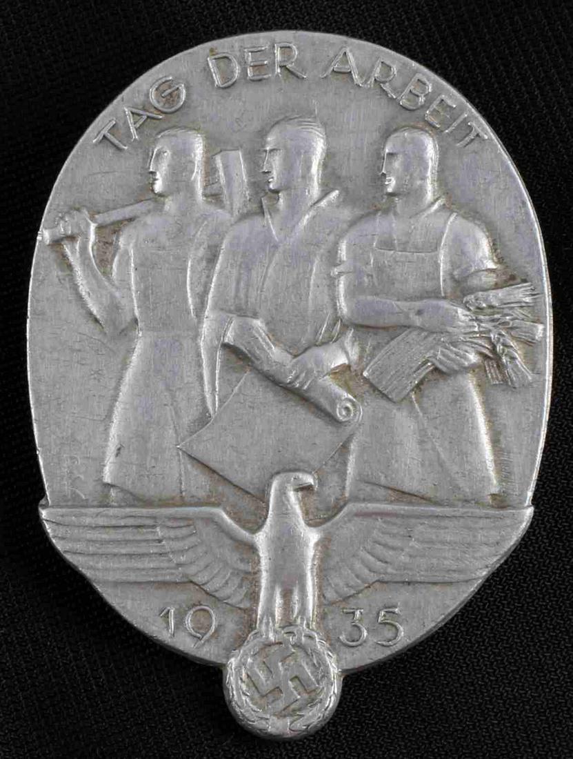 WWII GERMAN DAF WORKERS FRONT 1935 PIN DAY OF WORK: Aluminum pin with clear design, Adolf Besson Scwab Gmund marked to reverse. Good condition.