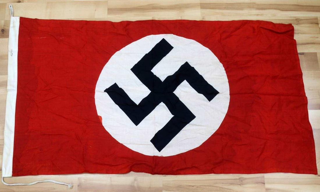WWII GERMAN THIRD REICH NSDAP PARTY FLAG: WWII German Reich NSDAP party flag measuring 58 inches wide by 30 inches tall. In good condition, does fluoresce. Stamped NSDAP on hoist. Unauthenticated, sold as is.