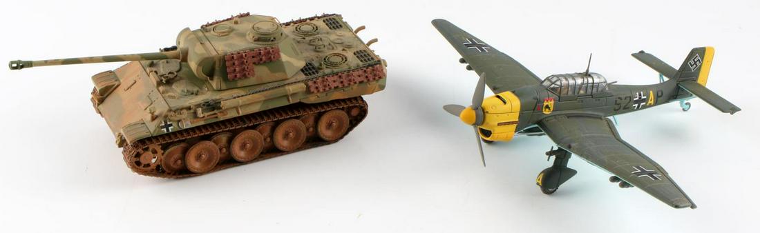 WWII GERMAN REICH PANZER V & JUNKERS STUKA MODELS: WWII German Reich Panzer V tank and Junkers JU 87 Stuka models In very good condition. Stuka measures 6 inches long with a wingspan of 7 1/2 inches; engine cover is removable. Panzer measures 2 9/16 i