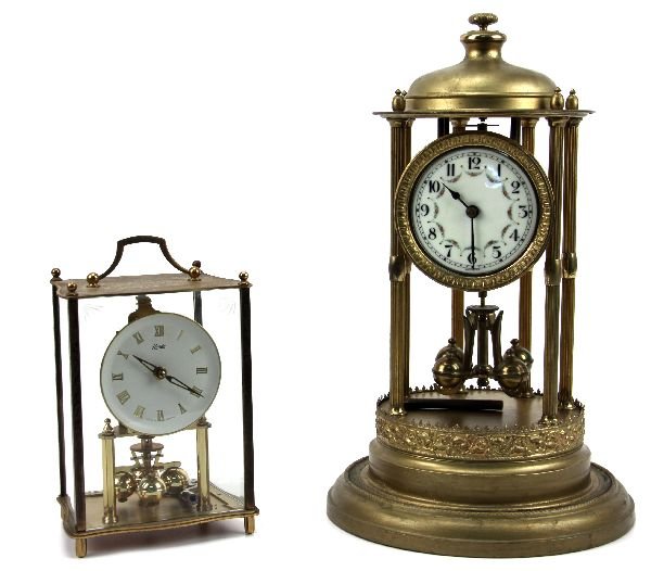 JAHRESUHREN FABRIK AND KUNDO GERMAN CLOCKS: Jahresuhren- Fabrik Germany 1904 400 day anniversary clock. Good condition. Also, a Kundo German clock in good condition.