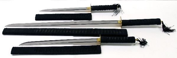 DECORATIVE ASIAN SWORD LOT W/ DISPLAY: A decorative lot of 3 Asian design swords with 12 inch, 14 inch, and 24 inch blades. Swords are in very good condition and include scabbards and display stand.