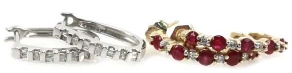 LADIES GOLD & DIAMOND HOOP EARRING LOT OF 2: One pair of 10k white gold hoop earrings with channel set diamond accents and one pair of 14k yellow gold hoop earrings with spinels and .25 tcw in diamonds. . Weight: 5.6 g . Condition: Very good