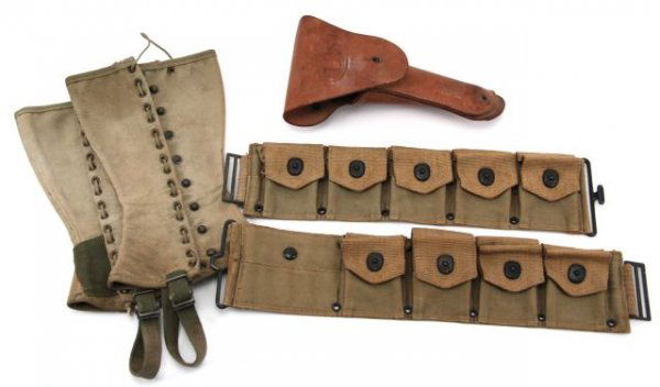 LOT OF WWII ERA AMMO BELT GAITERS AND HOLSTER: LOT OF WWI ERA AMMO BELT GAITERS AND HOLSTER Holster is stamped US, with Crump 1942 on back. Gaiters in good condition with laces. Two piece Garand ammo belt in good condition, with one pocket still c