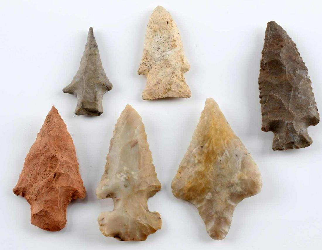 LOT OF 6 NATIVE AMERICAN FOUND ARROWHEAD ARTIFACTS: Flint and chert made. Notched. Good patination and mineralization. Found in Sumter, Pinetree, and Motley. Measure 2 - 2 3/4 range. From a private Florida collection.