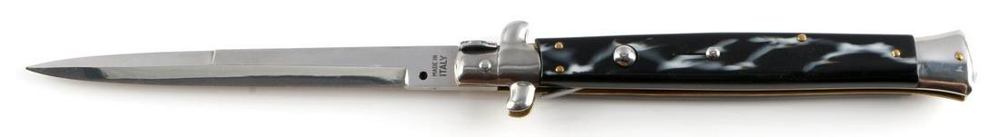 13 INCH ITALIAN MADE BLACK HANDLE SWITCH BLADE: Italian made switchblade. 13 inches open. Blade is made of stainless steel. Drop point blade. Very good condition.