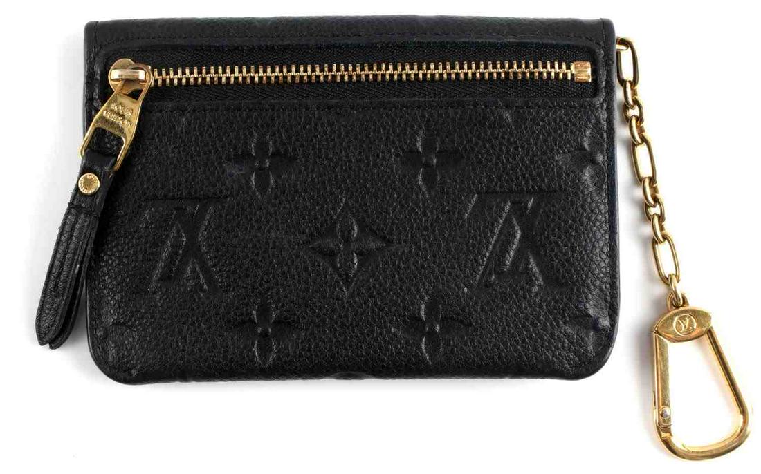 LOUIS VUITTON BLACK EMPREINTE LEATHER KEY POUCH: Louis Vuitton Monogram Empreinte leather key pouch with envelope style flap. It can hold cash, cards and other small items. It can be worn as a belt or bag charm, or slipped inside a bag. Condition: l