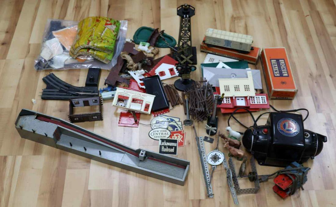 LIONEL TYPE ZW TRANSFORMER & TRAIN ACCESORIES: Transformer was said to have worked fine, untested by us, missing green light cover, in original box, accessories include, Lumber Loader in box , switches, refrigeration car, towers and much more.