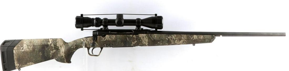 SAVAGE AXIS 7MM 08 BOLT ACTION RIFLE WITH SCOPE: Savage Axis 7mm-08 Remington caliber bolt action rifle with camouflage design and Weaver 3-9x40 scope. Polymer and steel construction. Fires 7mm-08 Remington ammunition. Bright and clear bore. Chamber