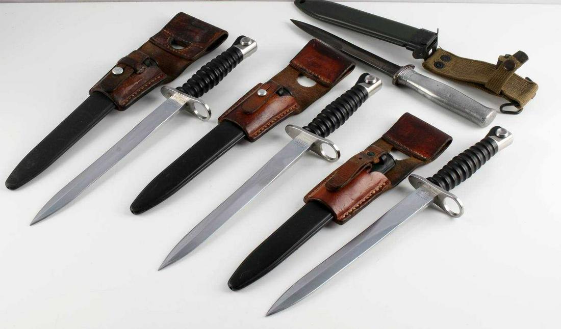 SWISS STURMGEWEHR M57 BAYONET & US M3 COMBAT KNIFE: Lot includes 3 Swiss M57 daggers and one US WWII M3 trench knife with M8 scabbard, marked US M3 RC Co, 6 7/8 inch blade, aluminum grip. Swiss daggers have 9.5 inch blades which are marked Victoria Sch