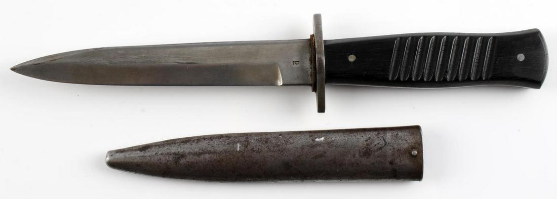 WWI WWII GERMAN FIGHTING BOOT KNIFE BY GOTTLIEB: Gottlieb Hammesfahr Solingen, Foche with German States proof mark opposite at ricasso, very good blade with dent free scabbard, ebony grips blade overall measures 10 3/4 inches.