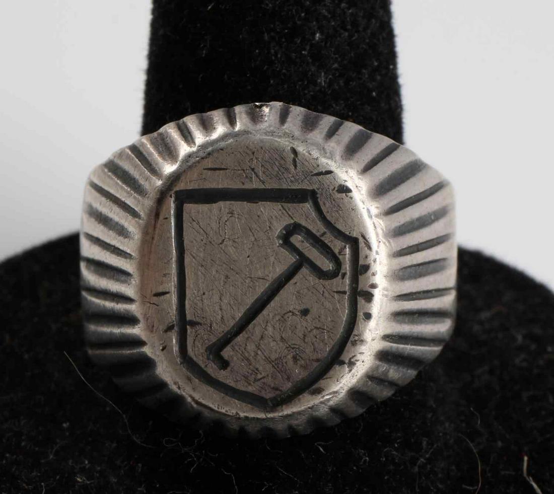 WWII GERMAN WAFFEN SS SILVER ADOLF HITLER RING: WWII German Waffen Leibstandarte SS Adolf Hitler silver ring. Size 11. Features 1st SS Panzer Division insignia to top. Engraved interior band reads " 1. SS Pz. Div. L SS AH.". Acid tested silver. 6.1