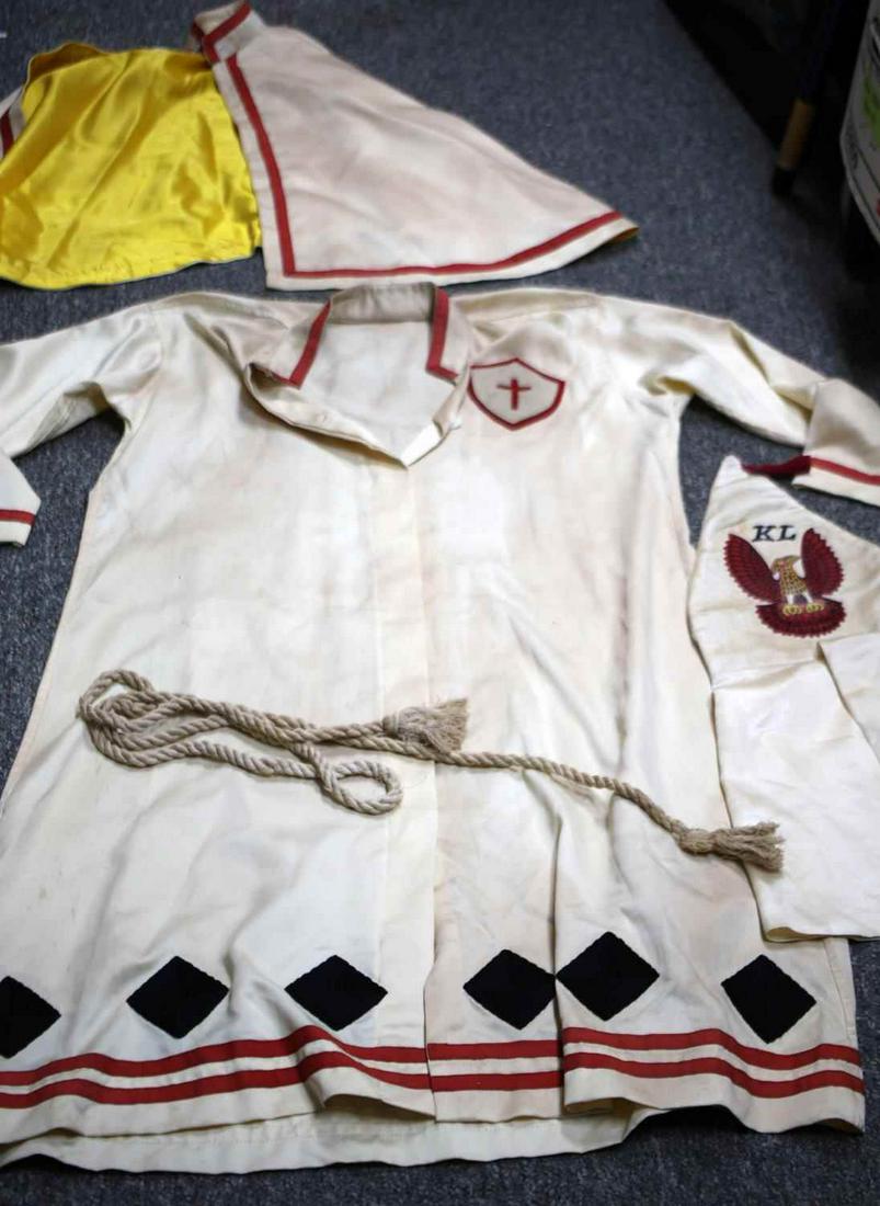 WOMENS KKK HIGH RANK MAJOR KLEAGLE KLAN ROBE: Women's KKK Major Kleagle Klan robe, hood, cape, and belt with carrying case. A Kleagle is a high ranking officer whom of which recruits and gives speeches. It is a position that is slightly lower tha