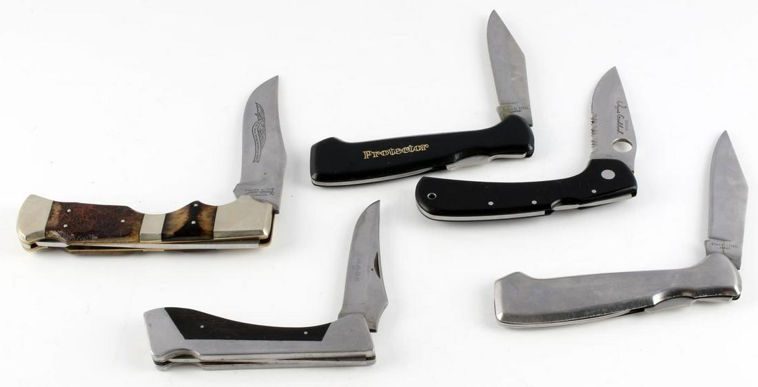LOT OF 5 LARGE FOLDING KNIVES KNIFE DIFF BRANDS: Lot includes: Protector (3.5 inch blade), Spyderco Wayne Goddard (3.5 inch blade), Sharp 300 (3.5 inch blade), 3.75 inch blade stainless Japan, and a Parker & Son M-1467 (4 inch blade.) Good condition