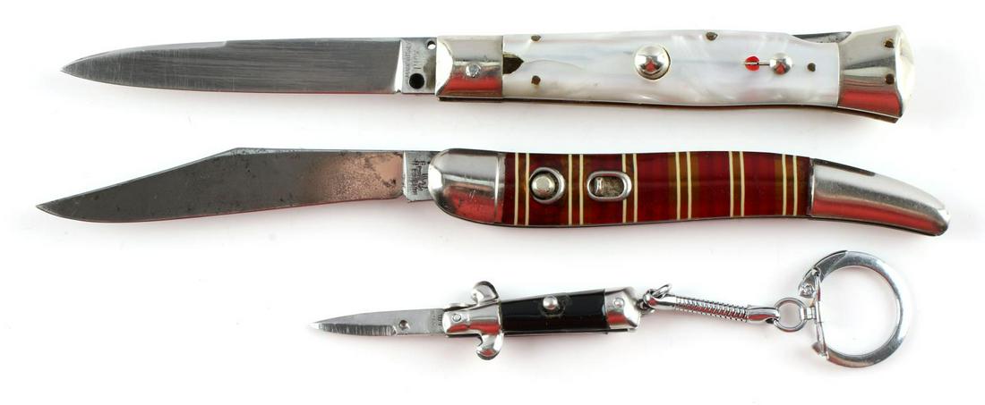 3 SWITCHBLADE KNIFE HAMMER BRAND ITALIAN MADE: Lot includes an Italian made switchblade with no maker's mark, a Hammer Brand USA made switchblade, and a miniature Italian switchblade keychain. Handle broken on white switchblade. Candy stripe knife