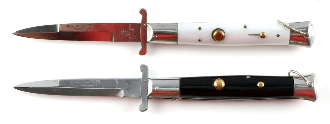 PASTOR ALEMAN RIZZUTO ESTILETO ITALIAN SWITCHBLADE: 2 Pastor Aleman Rizzuto Estileto switchblades. White and black grips. Measure 8 3/4 inches. Good condition with some scratches on blades.