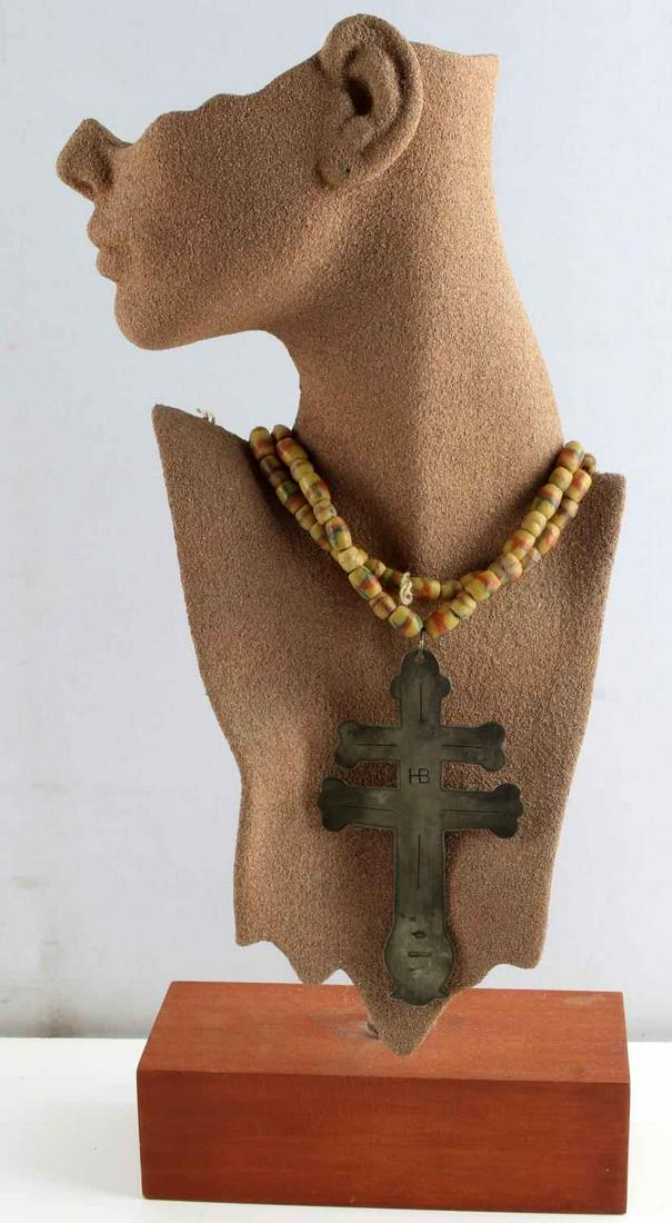 HB HUDSON BAY TRADE CROSS W BEAD NECKLACE: 5 3/4 inch brass Trade Cross marked HB, Hudson Bay, and Montreal. Beads measure 7.94 - 12.20mm. Framed in 12 x 8 inch riker mounted box. 17 inch length. Unauthenticated, sold as is.