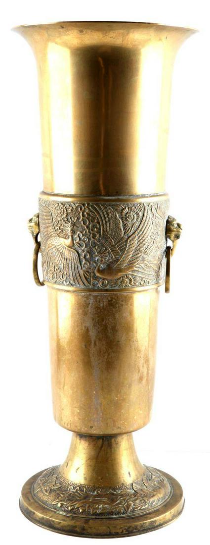 VINTAGE ASIAN SOUTH KOREAN BRASS UMBRELLA STAND: Vintage brass South Korean umbrella stand. Features ornate phoenix and flower design around the middle and base sections of the piece. Handles are lion heads. Stands 22 1/2 inches. Good condition.