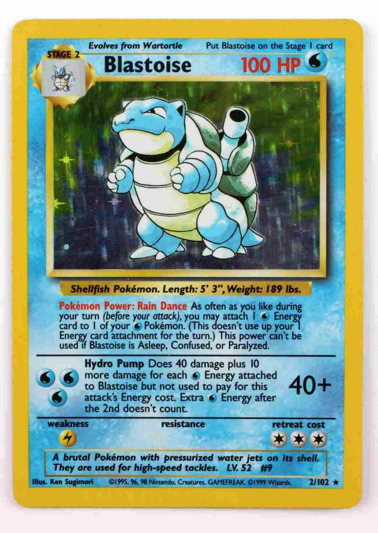 1999 GAMEFREAK HOLOGRAPHIC BLASTOISE POKEMON CARD: 1999 holographic Blastoise 2/102 base set Pokemon card. Ungraded but very good condition overall with the exception of a slight bend to the card and light scratching present on the holographic back. N