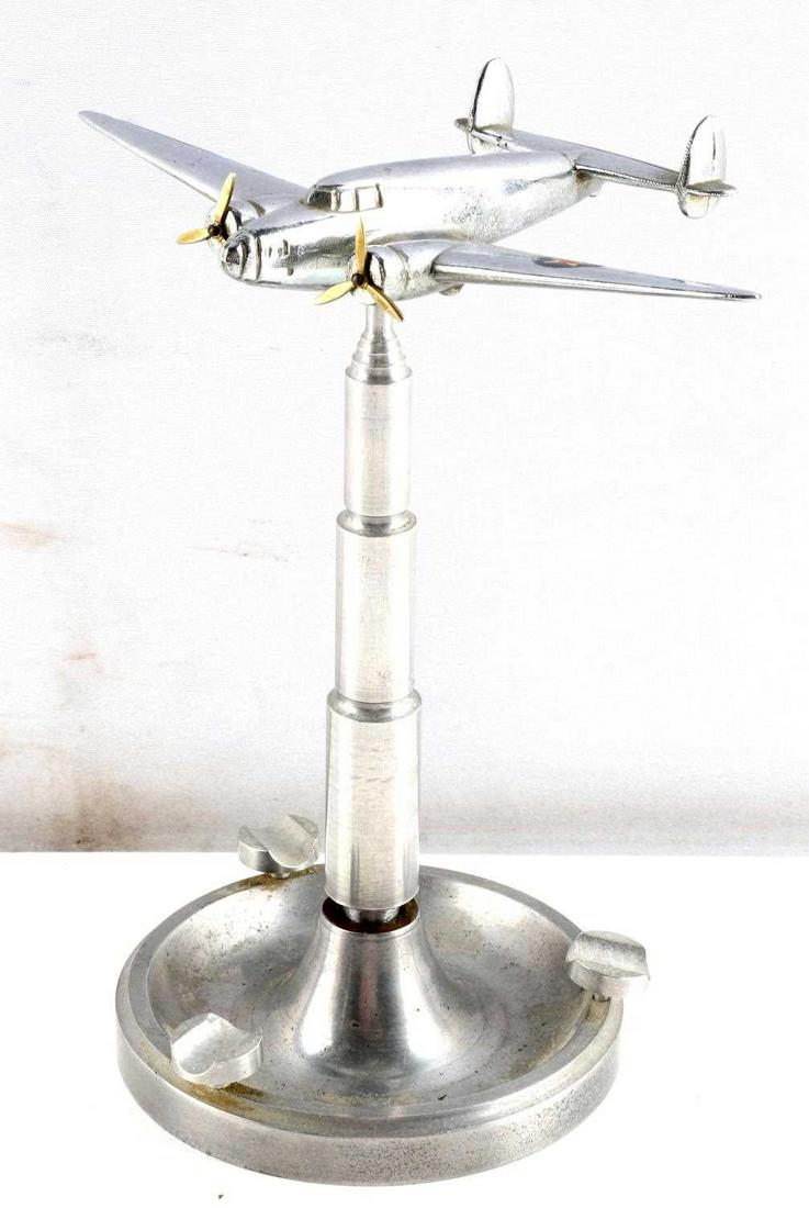 WWII TRENCH ART AIRCRAFT AIRPLANE ASHTTRAY: Possible a Hudson Lockheed airplane, piston ashtray, 8 by 7 inches.