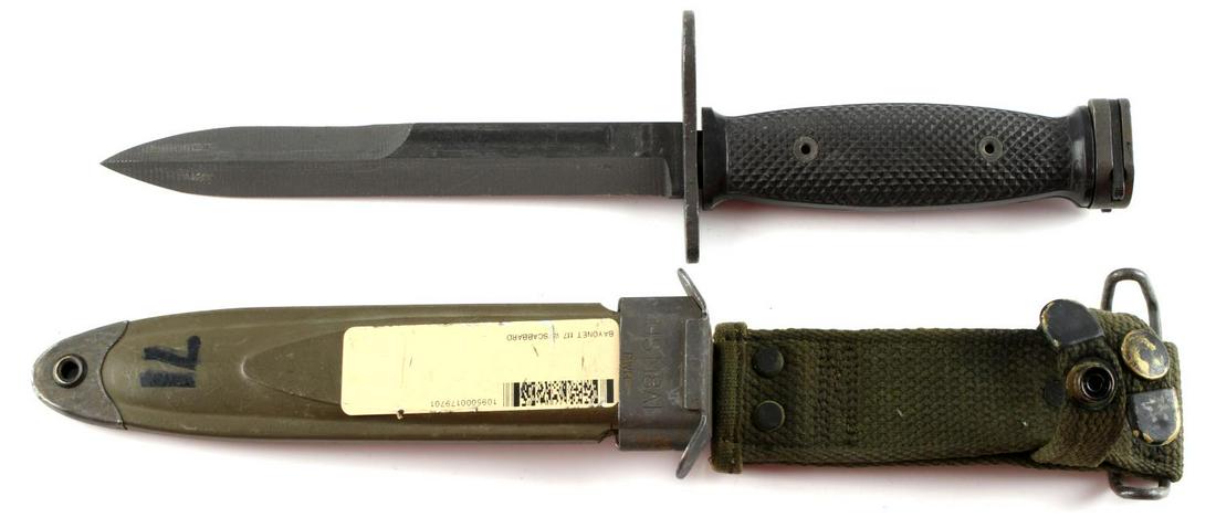 VIETNAM US M7 FIGHTING KNIFE BAYONET W SCABBARD: US M7 fighting knife bayonet with scabbard. Blade unmarked. US M7 and 800 marked to crossguard. Measures 12 inches. Good condition.