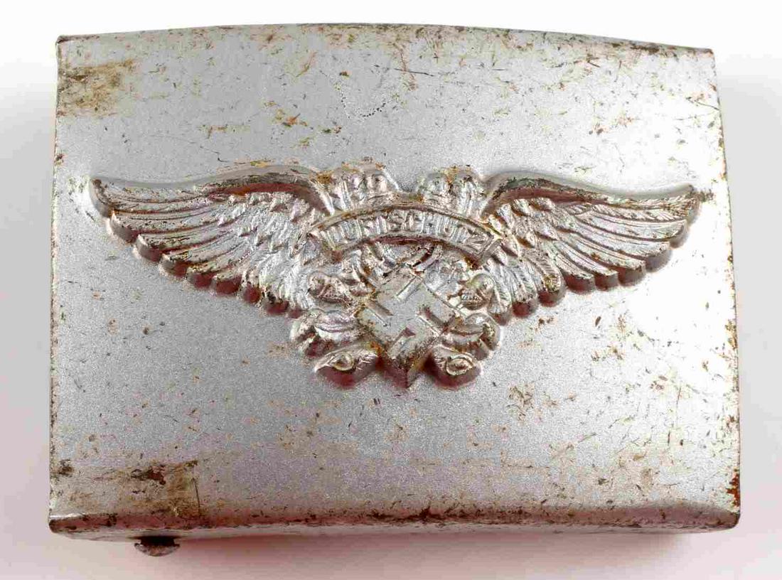 WWII GERMAN THIRD REICH LUFTSCHUTZ BELT BUCKLE: Third Reich Luftschutz belt buckle. Features scratching and some oxidation. Measures 2 5/8 inches. This lot has a reserve.
