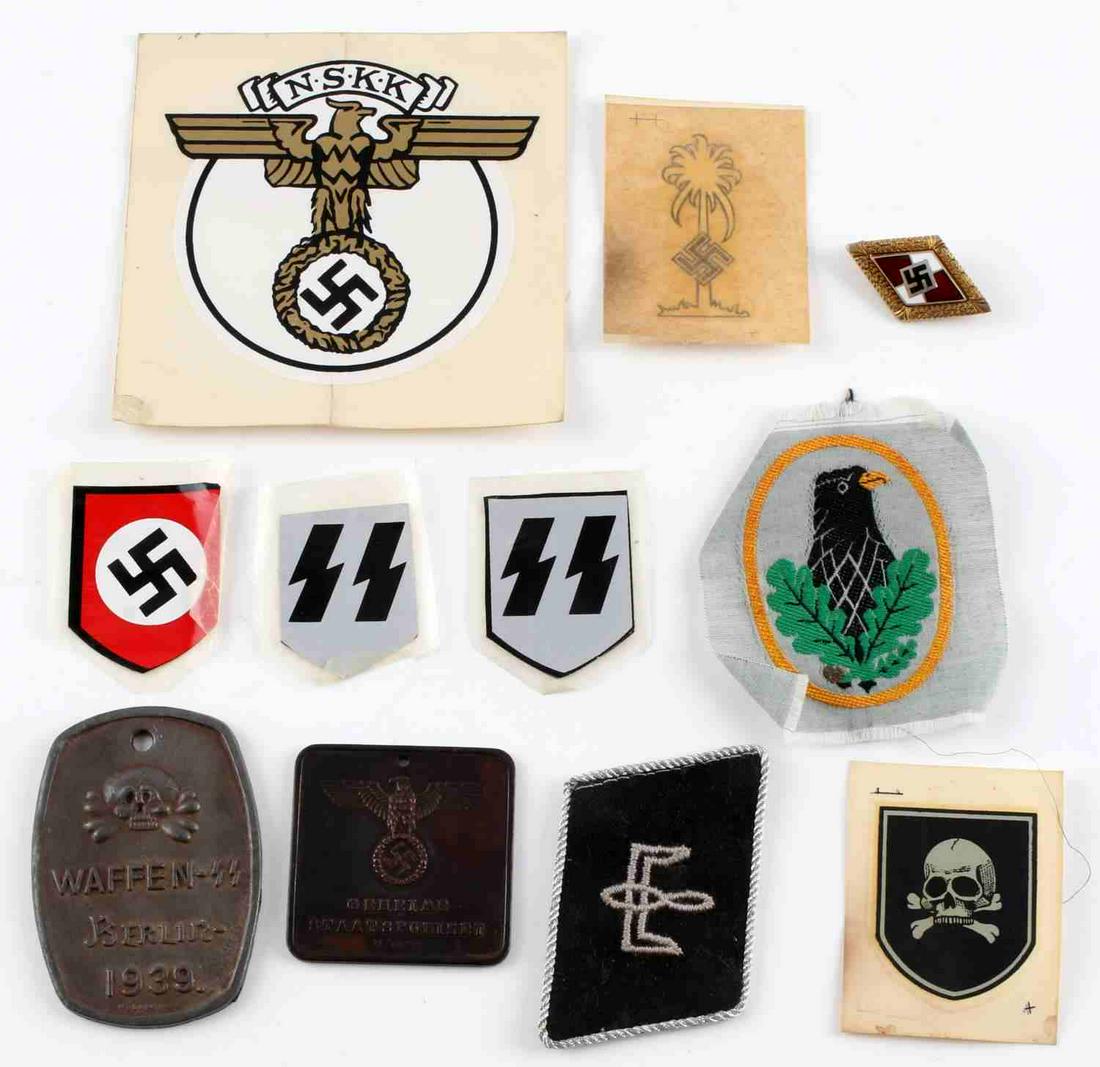 12 WWII GERMAN THIRD REICH SS DECAL ID PLAQUE: Lot includes SS sticker decals, an SS totenkopf patch, an Afrika Korps decal, NSKK decal, a Sniper Badge patch, HitlerJugend pin, and a police ID. Measurements 1 3/8 - 4 inches. Good condition. range 