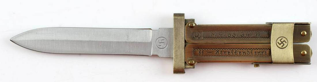 WWII GERMAN REICH SS LUFTWAFFE PARATROOPER KNIFE: Third Reich SS paratrooper folding knife. Brass construction. RZM M7/66/34/SS marked. Good condition. Measures 6 inches. Unauthenticated, sold as is. This lot has a reserve.