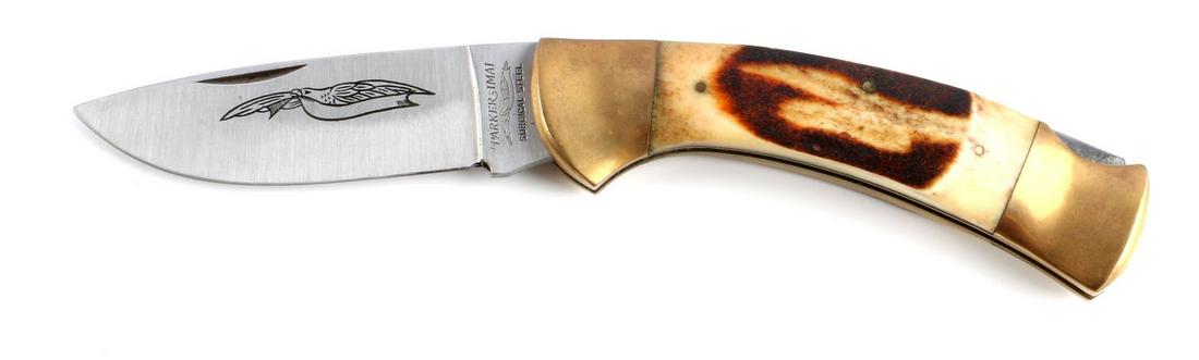 PARKER IMAI SECOND CUT STAG LOCK BACK POCKET KNIFE: Parker-Imai Eagle Brand second cut stag lock back pocket knife. Standard maker's marks on blade. Measures approximately 5 inches when closed. In original box. Very good condition overall.