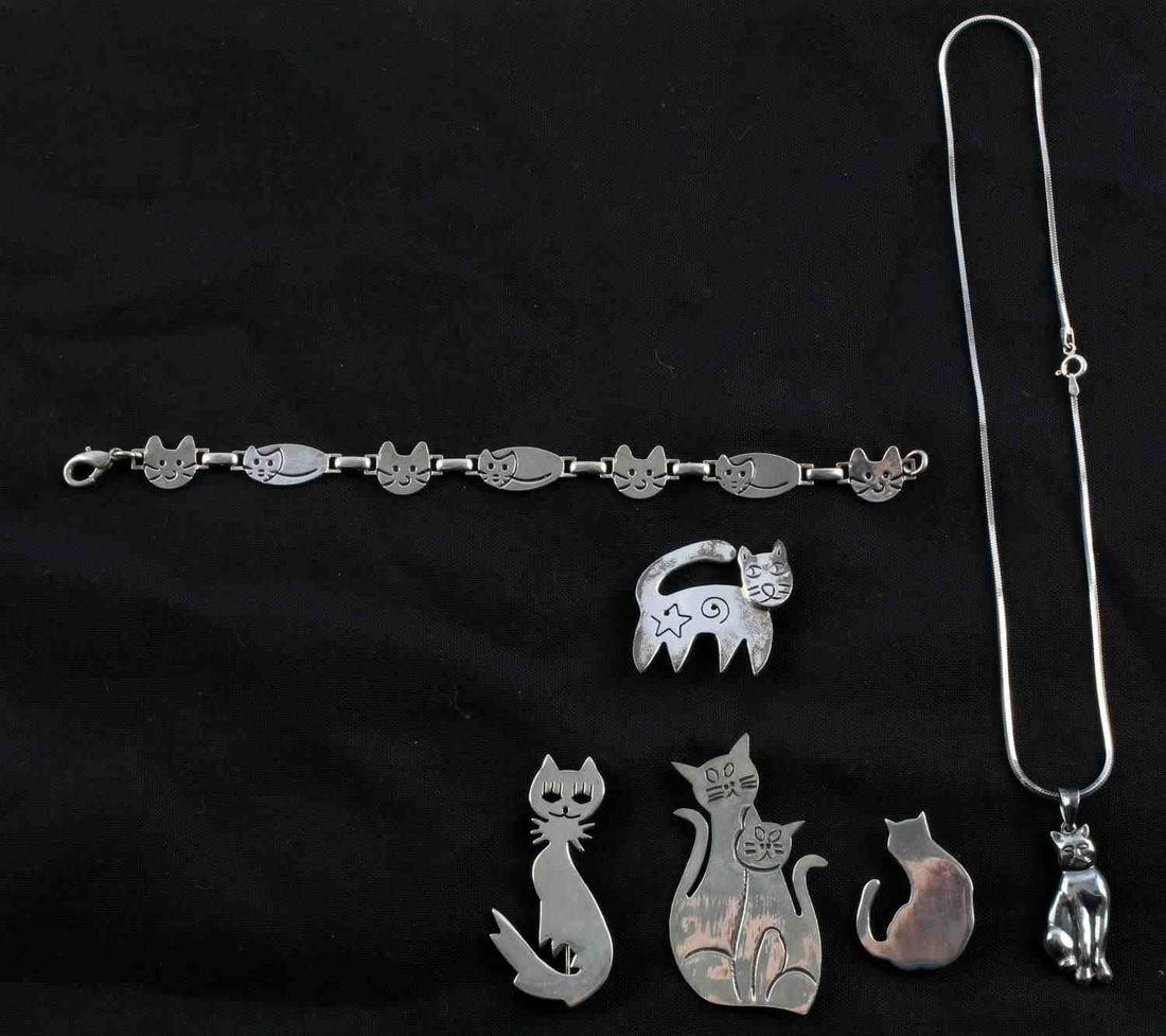 STERLING SILVER CAT JEWELRY BRACELET PIN NECKLACE: Necklace length 16 inches, bracelet 7 1/2 inches, Pins range from 2 1/2 to 1 1/2 inches. All tested as sterling silver. Total weight 63 grams This lot has a reserve.