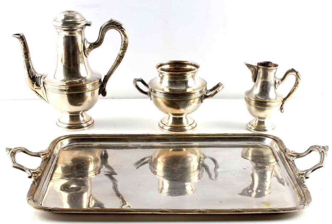 4 PC FRENCH TEA SET SWASTIKA RR METARGENT HALLMARK: Four piece silver plate 20 X 12 inch tray, pre Third Reich Swastika over RR in square cartouche, the other Metargent, some plate loss showing copper. Damage to pot top.