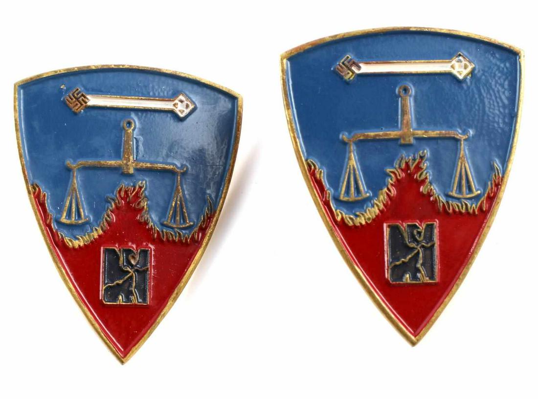 2 POST WWII GERMAN NUREMBERG TRIALS PINS: 2 German Nuremberg trials pins. Red, white, and blue enamel on brass. Screwback. Marked L. CHR LAUER Nurnberg. Measure 1.5 inches. Good condition.