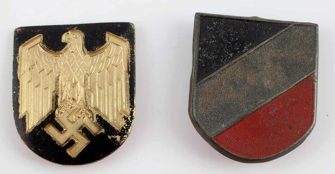 WWII GERMAN REICH PITH HELMET SHIELDS TRICOLOR: WWII German Reich pair of pith helmet shields to include a German tricolor shield in good condition with three prongs on reverse; other shield is a Reichsadler styled eagle, reverse with three prongs 